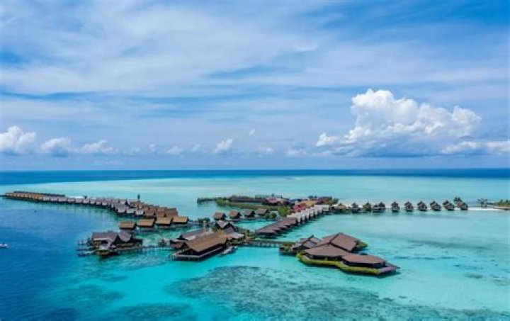 How do you get to Sabah from Mabul Island?