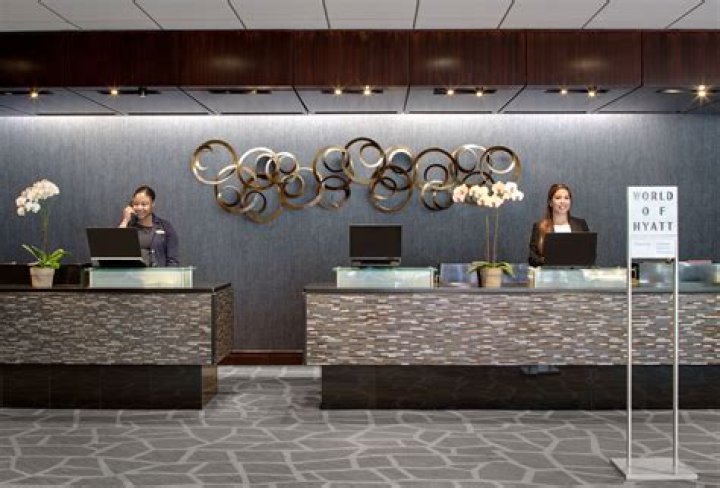 How much does the Hyatt pay front desk?